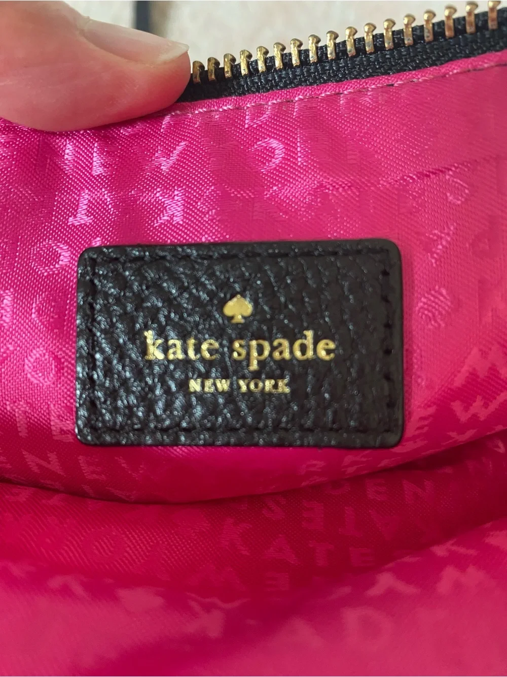 Kate Spade Black Pebbled Leather Crossbody Bag with pink interior